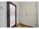 Inviting foyer with a decorative glass door and neutral tile flooring at 4411 N 24Th Way, Phoenix, AZ 85016
