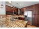 Contemporary kitchen featuring stainless steel appliances and granite countertops at 4411 N 24Th Way, Phoenix, AZ 85016
