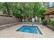 Community spa offers residents a private area with lush landscaping at 4411 N 24Th Way, Phoenix, AZ 85016