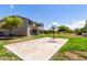 Spacious backyard featuring a basketball court and lush greenery at 4490 S Rio Dr, Chandler, AZ 85249