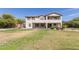 Large two-story home with spacious backyard and well-maintained lawn perfect for outdoor activities at 4490 S Rio Dr, Chandler, AZ 85249