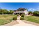 Manicured backyard with lush greenery, stepping stone path and outdoor seating areas perfect for entertaining at 4490 S Rio Dr, Chandler, AZ 85249
