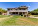 Expansive backyard featuring lush greenery, patio space, and a well-manicured lawn, ideal for relaxation and recreation at 4490 S Rio Dr, Chandler, AZ 85249