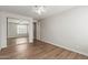 Bedroom featuring wood floors, large mirrored closet at 4490 S Rio Dr, Chandler, AZ 85249