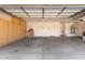 Spacious garage with built-in storage cabinets and ample room for parking and projects at 4490 S Rio Dr, Chandler, AZ 85249