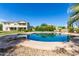 Enjoy the backyard pool and serene surroundings perfect for relaxation with beautiful landscaping and comfortable seating at 4490 S Rio Dr, Chandler, AZ 85249