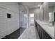 Modern bathroom featuring a glass shower, dual sink vanity, and contemporary finishes at 4777 S Fulton Ranch Blvd # 1024, Chandler, AZ 85248
