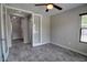 Inviting bedroom featuring wood-look tile floors and light neutral colors at 4777 S Fulton Ranch Blvd # 1024, Chandler, AZ 85248