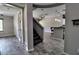Inviting foyer leads to the living area and staircase, featuring wood-look tile flooring at 4777 S Fulton Ranch Blvd # 1024, Chandler, AZ 85248
