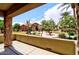 View from the shaded patio, showcasing the well-maintained landscaping and community features at 4777 S Fulton Ranch Blvd # 1024, Chandler, AZ 85248