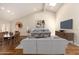 Open concept living area boasts a vaulted ceiling, skylight, and modern furnishings at 6313 E Aire Libre Ln, Scottsdale, AZ 85254