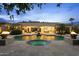 Outdoor oasis featuring a pool, spa, fountain, and covered patio with ample seating at 6852 E Fanfol Dr, Paradise Valley, AZ 85253