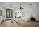 Spacious main bedroom featuring a seating area, recessed ceilings, and ample natural light at 6852 E Fanfol Dr, Paradise Valley, AZ 85253