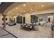 Expansive covered patio offers dining and lounge areas, seamlessly blending indoor and outdoor living at 6852 E Fanfol Dr, Paradise Valley, AZ 85253