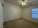 Bedroom with closet and ceiling fan at 703 E Taylor Trl, San Tan Valley, AZ 85143