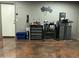 Well organized garage features multiple workbenches and machinery at 703 E Taylor Trl, San Tan Valley, AZ 85143