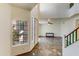 Bright open foyer with high ceilings, decorative tile flooring, and a view into the living room at 7326 W Pershing Ave, Peoria, AZ 85381