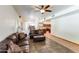 Inviting living room features comfortable seating, natural light, and easy access to the kitchen and dining areas at 7326 W Pershing Ave, Peoria, AZ 85381