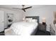 Bright main bedroom featuring a ceiling fan, large window and a comfortable-looking bed at 7350 N Via Paseo Del Sur -- # Q105, Scottsdale, AZ 85258