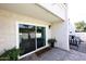 Charming patio with sliding glass door and decorative pavers offers a serene outdoor living space at 7350 N Via Paseo Del Sur -- # Q105, Scottsdale, AZ 85258