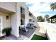 Relax on this welcoming patio with comfortable seating, decorative pavers, and stylish outdoor decor at 7350 N Via Paseo Del Sur -- # Q105, Scottsdale, AZ 85258