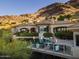 Custom pool and spa with mountain views, lush landscaping, and ample seating area at 7801 N Saguaro Dr, Paradise Valley, AZ 85253
