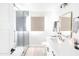 Modern bathroom featuring a glass shower, sleek vanity, and ample lighting for a serene experience at 8132 E Valley View Rd, Scottsdale, AZ 85250
