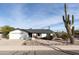 Charming single-story home with desert landscaping, showcasing curb appeal in a quiet residential neighborhood at 8132 E Valley View Rd, Scottsdale, AZ 85250