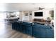 Spacious open-concept living area with an island, seamlessly connecting the kitchen and living room at 8132 E Valley View Rd, Scottsdale, AZ 85250