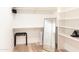 Bright walk-in closet with modern shelving, ample storage space, and a convenient full-length mirror at 8132 E Valley View Rd, Scottsdale, AZ 85250