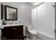 Bathroom featuring vanity, mirror, toilet, and shower with white shower curtain at 820 W University Dr # 4, Tempe, AZ 85281