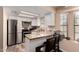 Bright kitchen with stainless steel appliances, a breakfast bar, and granite countertops at 820 W University Dr # 4, Tempe, AZ 85281