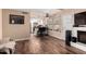 This spacious living room features wood floors, plenty of light, and flows into the kitchen at 820 W University Dr # 4, Tempe, AZ 85281