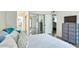 Bright bedroom featuring fresh linen, modern color schemes, and ample closet space at 873 W Sterling Pl, Chandler, AZ 85225