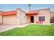 Inviting single-story home featuring a two-car garage, desert landscaping, and a welcoming front porch at 873 W Sterling Pl, Chandler, AZ 85225