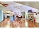Open-concept living area with vaulted ceilings, modern flooring, and seamless kitchen integration at 873 W Sterling Pl, Chandler, AZ 85225