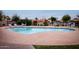 Community pool with lounge chairs and meticulously maintained landscaping offers residents a refreshing escape at 873 W Sterling Pl, Chandler, AZ 85225