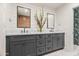Modern bathroom vanity with dual sinks, designer wallpaper, shiplap, and elegant fixtures at 8814 N 86Th St, Scottsdale, AZ 85258