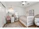 Cozy bedroom with a desk, bed, and charming decor at 8814 N 86Th St, Scottsdale, AZ 85258