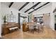 Elegant dining area with modern lighting, piano, barrel ceiling, and a cozy built-in booth at 8814 N 86Th St, Scottsdale, AZ 85258