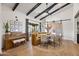 Stylish dining area featuring unique architecture, piano and modern seating at 8814 N 86Th St, Scottsdale, AZ 85258