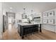 Bright kitchen boasts a center island with seating, stainless steel appliances, and stylish decor at 8814 N 86Th St, Scottsdale, AZ 85258