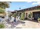 Beautiful backyard patio with a heater, comfortable seating, and lush greenery offering a private outdoor retreat at 8814 N 86Th St, Scottsdale, AZ 85258