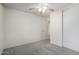 Bedroom featuring carpet, closet with sliding doors and a ceiling fan at 900 E Saratoga St, Gilbert, AZ 85296