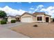 A single-Gathering home with a well-maintained yard and an attached two-car garage at 900 E Saratoga St, Gilbert, AZ 85296