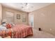Bedroom with carpet, a ceiling fan, and access to the backyard at 9137 E Odessa St, Mesa, AZ 85207