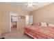 Bedroom with a ceiling fan and a large closet at 9137 E Odessa St, Mesa, AZ 85207