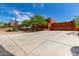 Inviting two-story home with desert landscaping and concrete driveway at 9137 E Odessa St, Mesa, AZ 85207