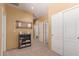 Bright hallway with decorative mirror, adjacent to bedroom and closet space, offering ample storage at 9137 E Odessa St, Mesa, AZ 85207