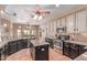 Well-equipped kitchen with granite countertops, tiled floors, and stainless steel appliances at 9137 E Odessa St, Mesa, AZ 85207